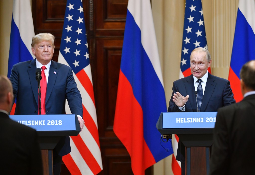 US President Donald Trump (L) and Russia's President Vladimir Putin attend a joint press conference after a meeting at the Presidential Palace in Helsinki, on July 16, 2018. - The US and Russian leaders opened an historic summit in Helsinki, with Donald Trump promising an "extraordinary relationship" and Vladimir Putin saying it was high time to thrash out disputes around the world. (Photo by Yuri KADOBNOV / AFP)        (Photo credit should read YURI KADOBNOV/AFP/Getty Images)